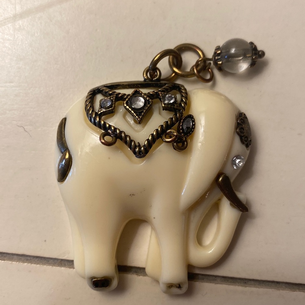 Hand-made elephant pendant for necklace.